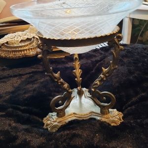 Glass bowl on brass stand